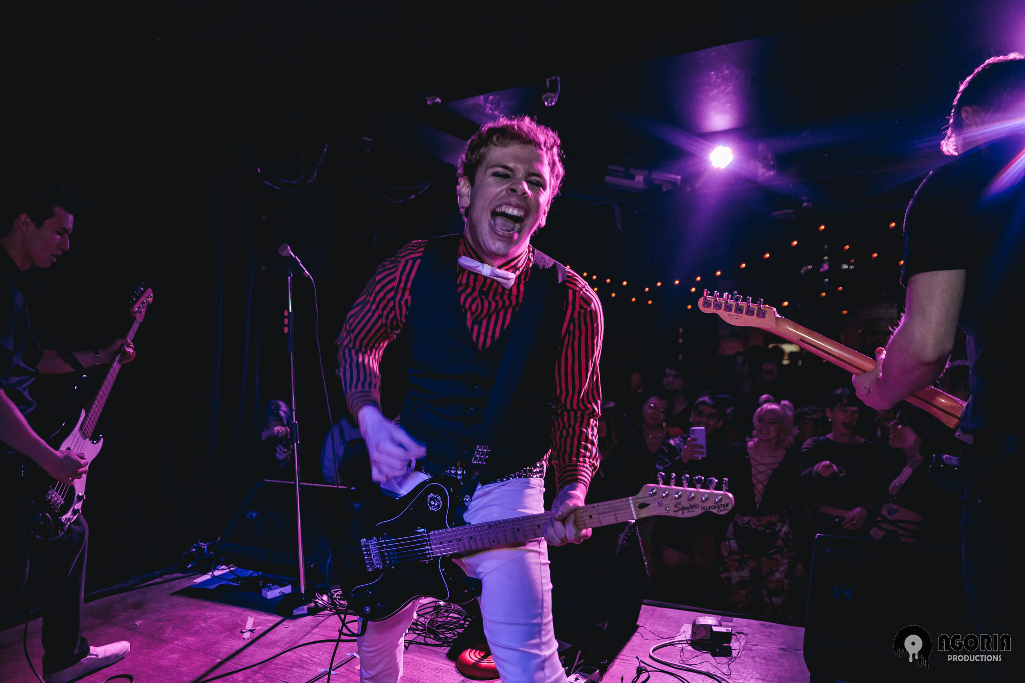 Fluffio playing live on stage at the baby g in toronto performing with the rpc screaming while playing guitar