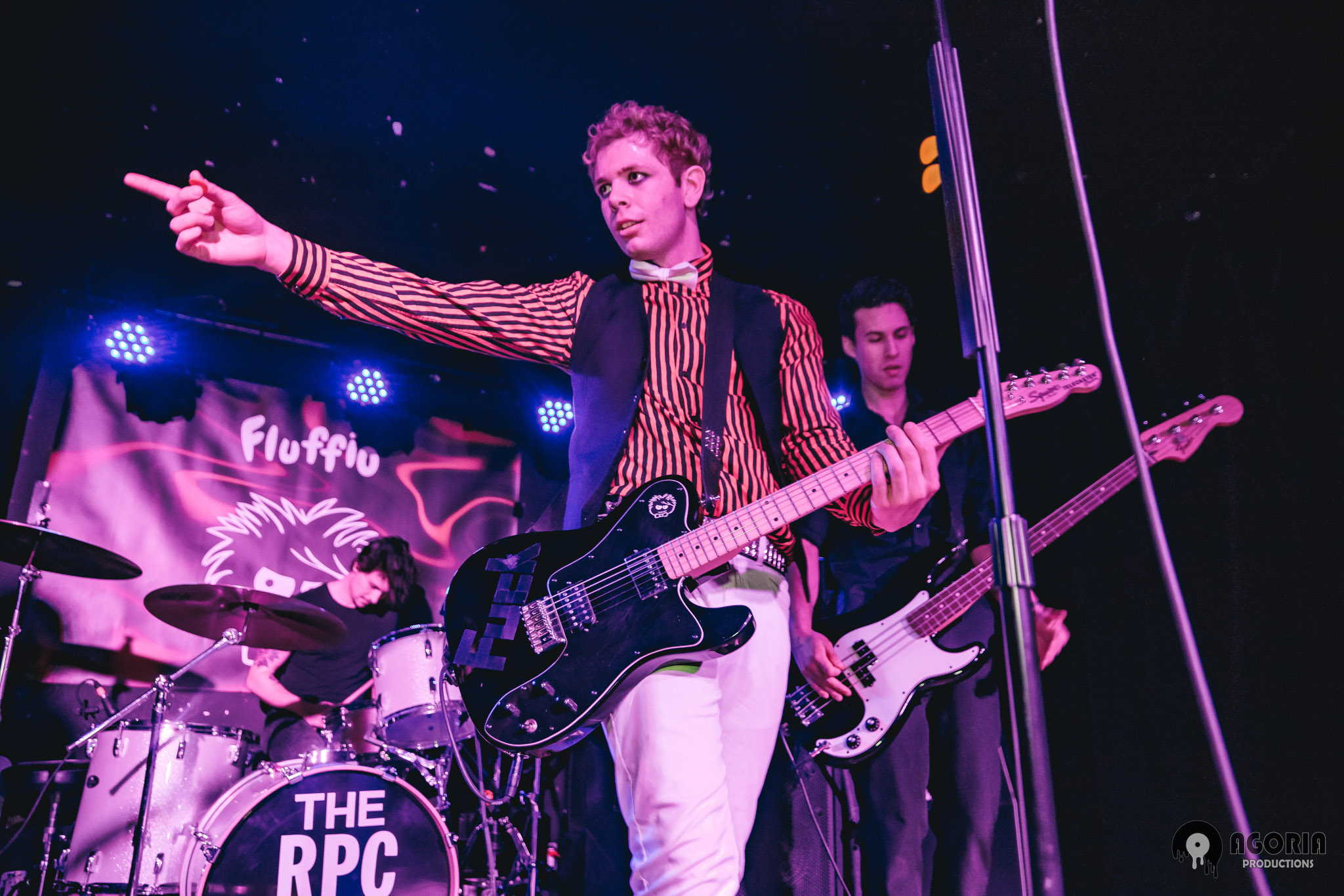 Fluffio & The RPC playing live in Toronto at The Baby G Pointing to crowd holding guitar