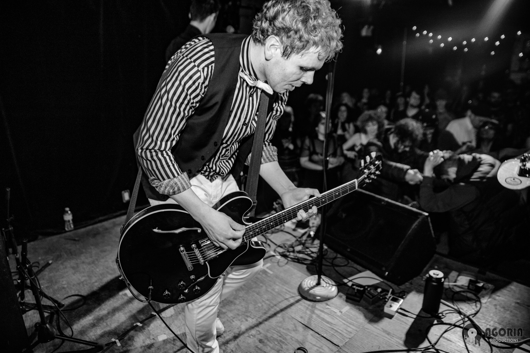 Fluffio playing guitar live at the baby G in toronto black and white