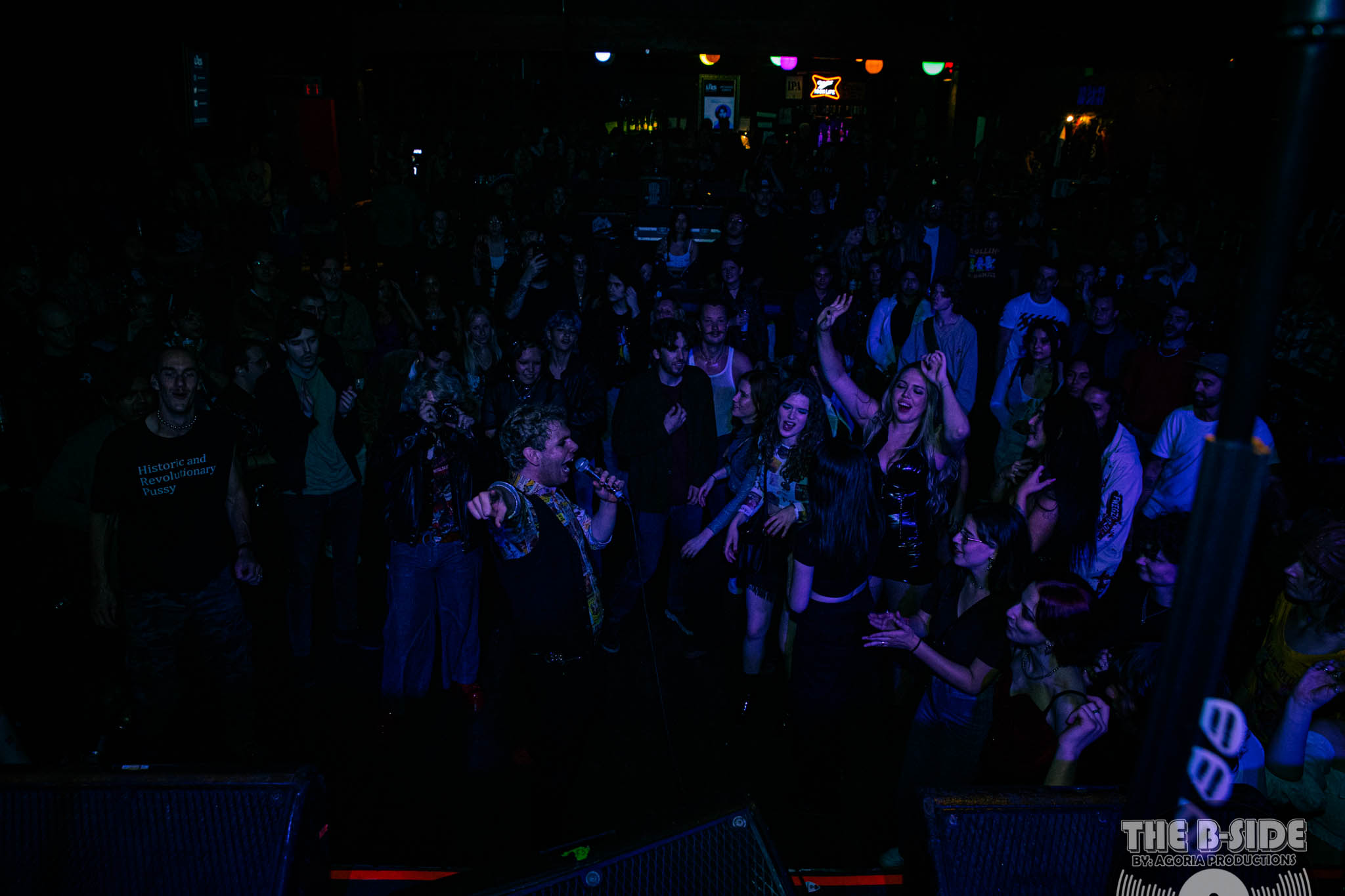 Fluffio in the crowd yelling and singing at Lee's Palace performance in Toronto