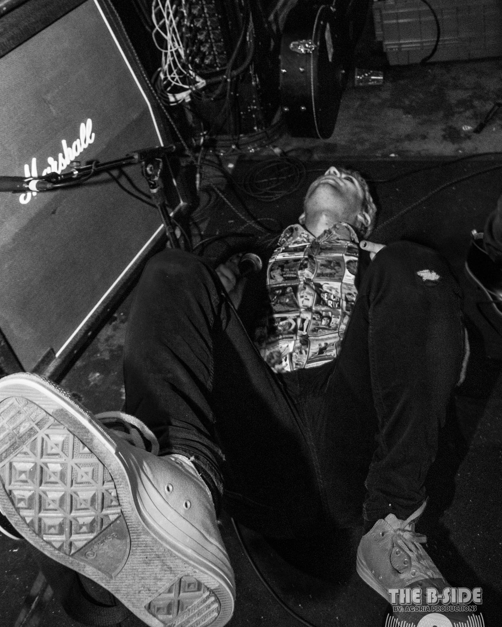 Fluffio on the ground on stage at Lee's Palace performance in Toronto