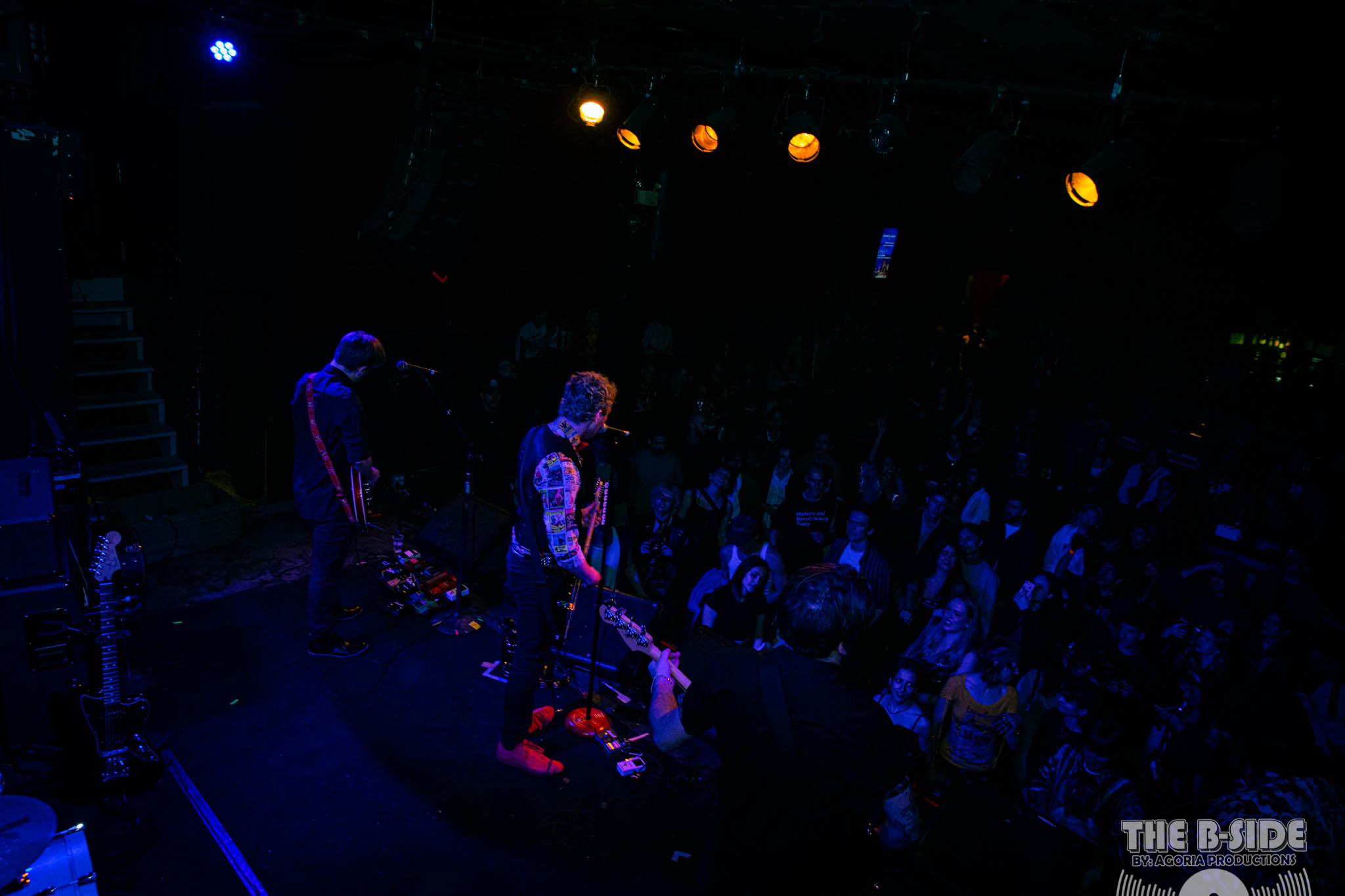 Fluffio and the RPC on stage from behind looking at big crowd playing song live at Lee's Palace in Toronto